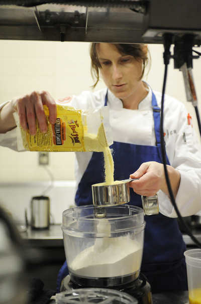Katie Weinner cooks during an episode of Top Chef (Photo by David Moir/Bravo)